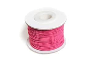 Rulle med pink elastiksnor på 1,2mm x 25m til perlearbejde.